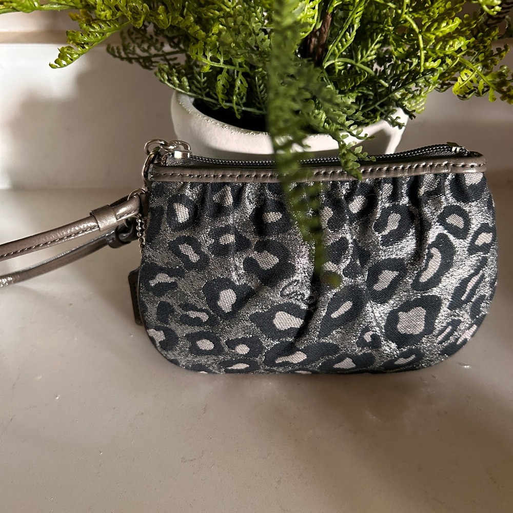 033. Coach Leopard Ocelot Wristlet